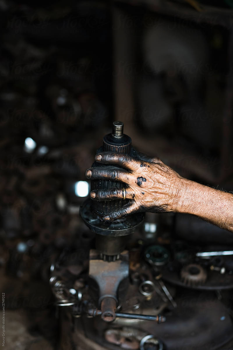 A person at work in a mechanical workplace
