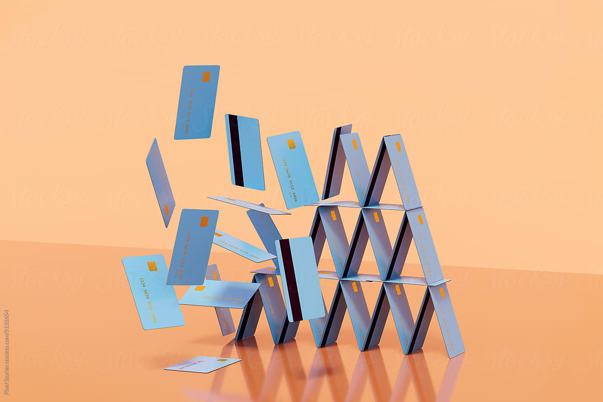 Blue credit / debit house of cards / pyramid. Debt / payment concept