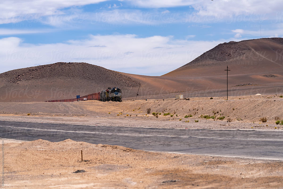 Train Travels Through The Bolivian Altiplano Transporting Minerals