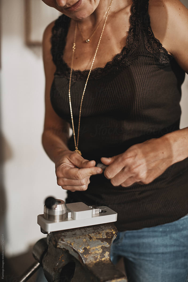 Female artisan working on a new piece of jewelry