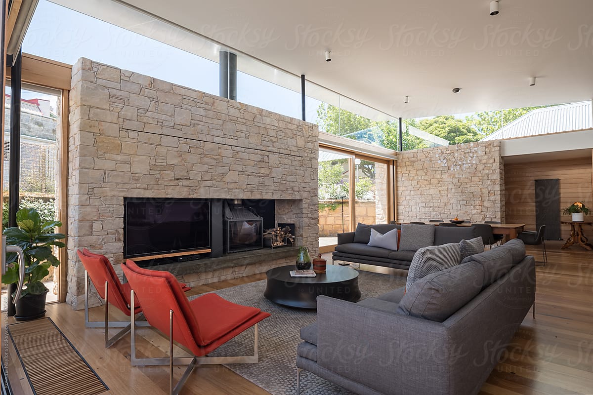 Luxurious lounge interior with stone fireplace