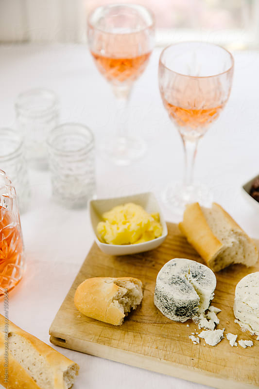 Rose wine, cheese, bread and preserved figs.