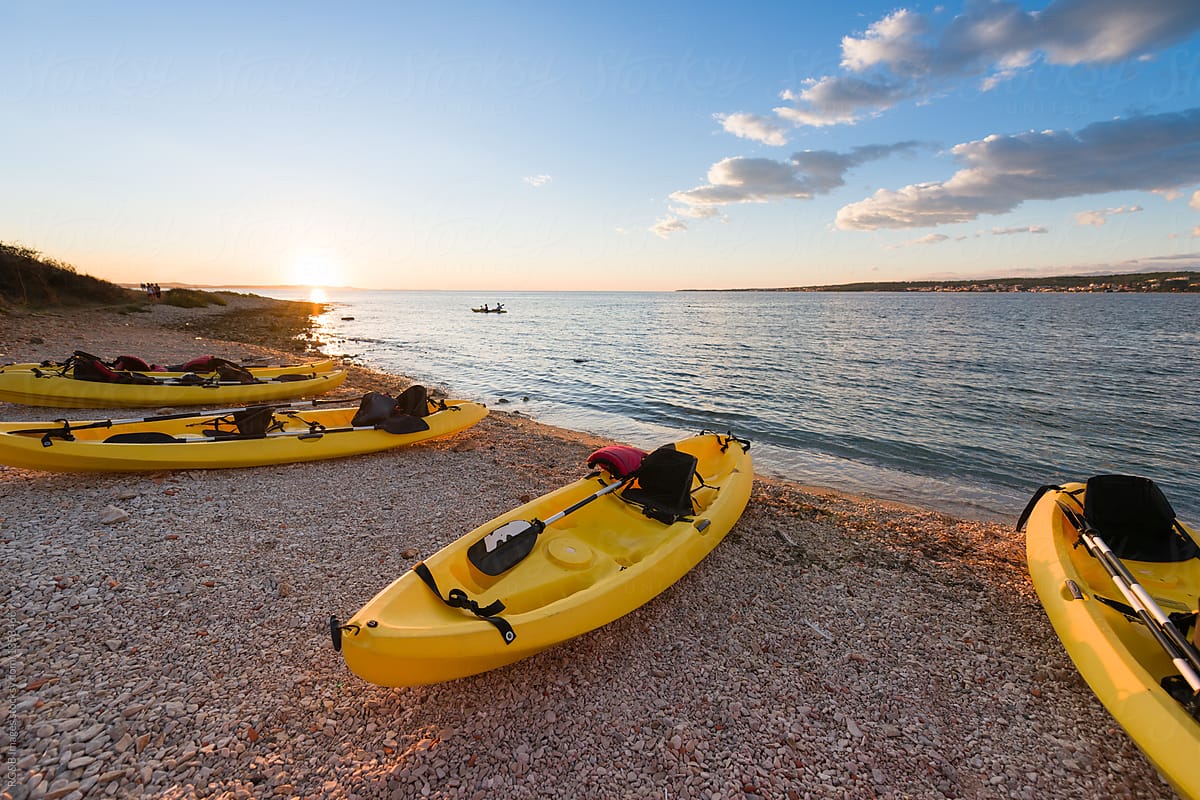 Yellow kayaks on the seashore