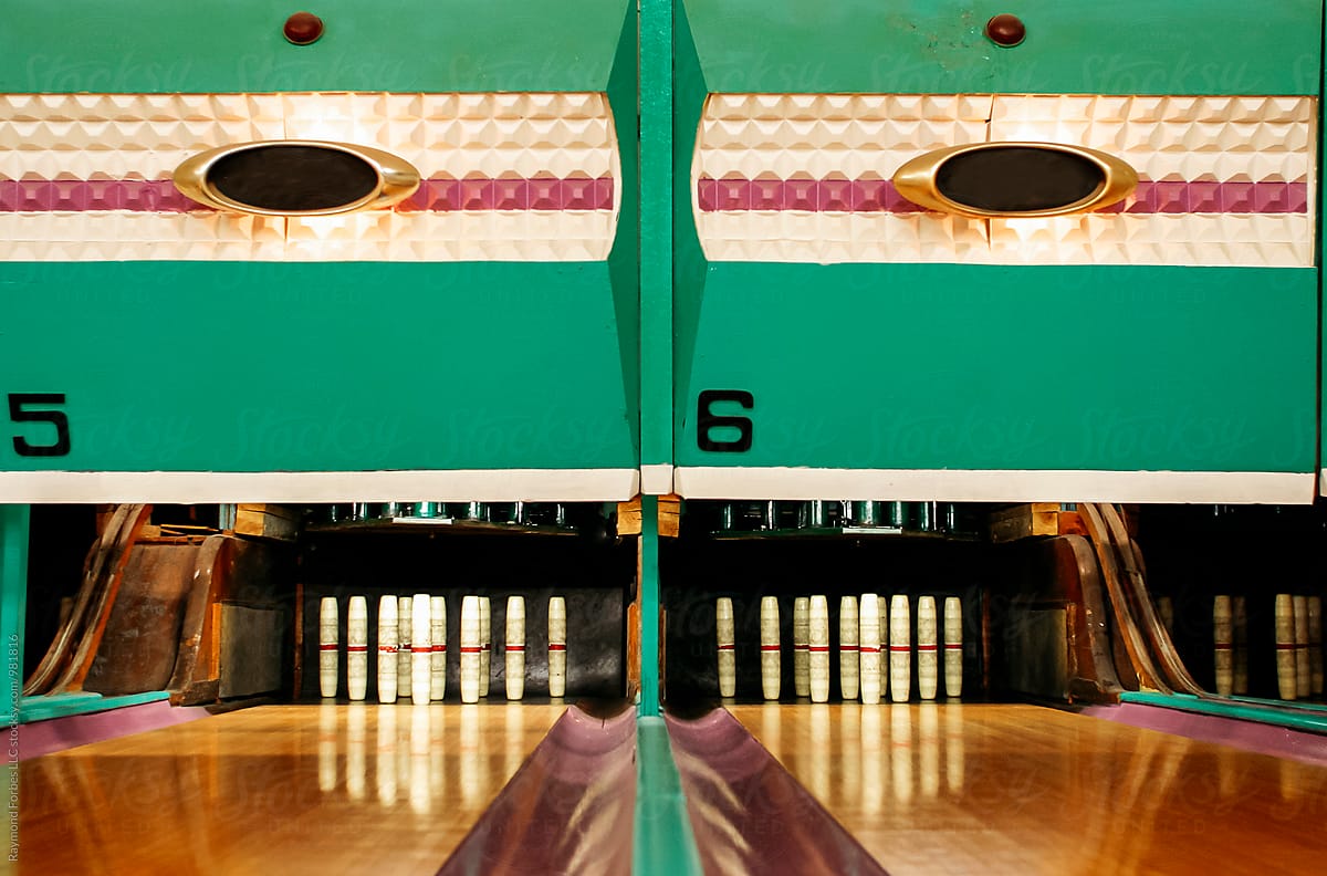 Bowling Shoes And Bowling Ball In Bowling Alley by Stocksy