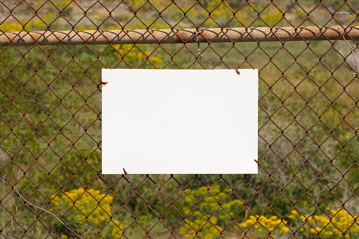 Blank Sign on Old Fence