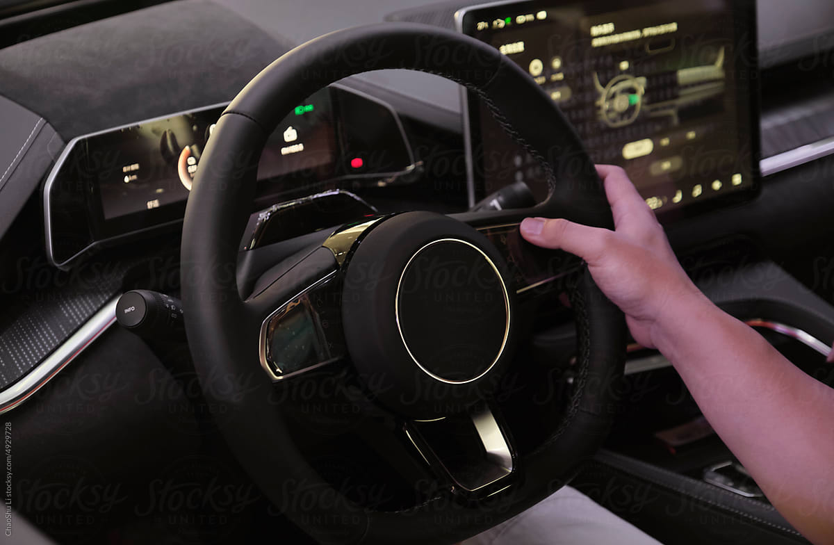 Closeup of new electric energy car steering wheel