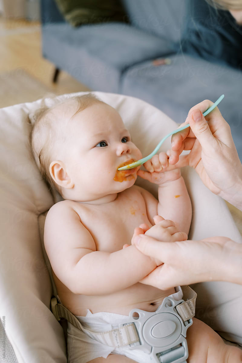 Feeding Baby With A Spoon