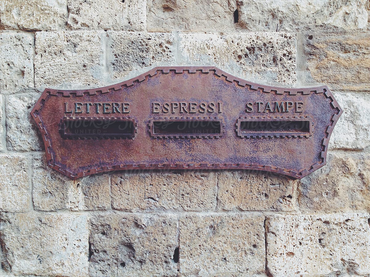 An old historic postal mail box in Tuscany, Italy