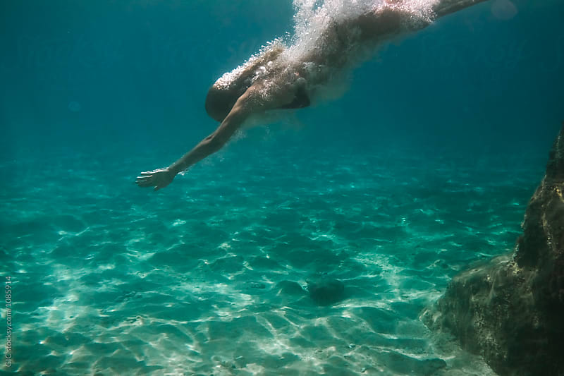 Woman diving into sea
