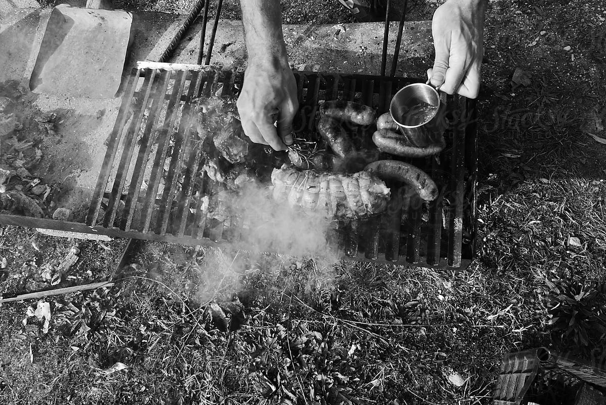 Man\'s hands preparing barbecue