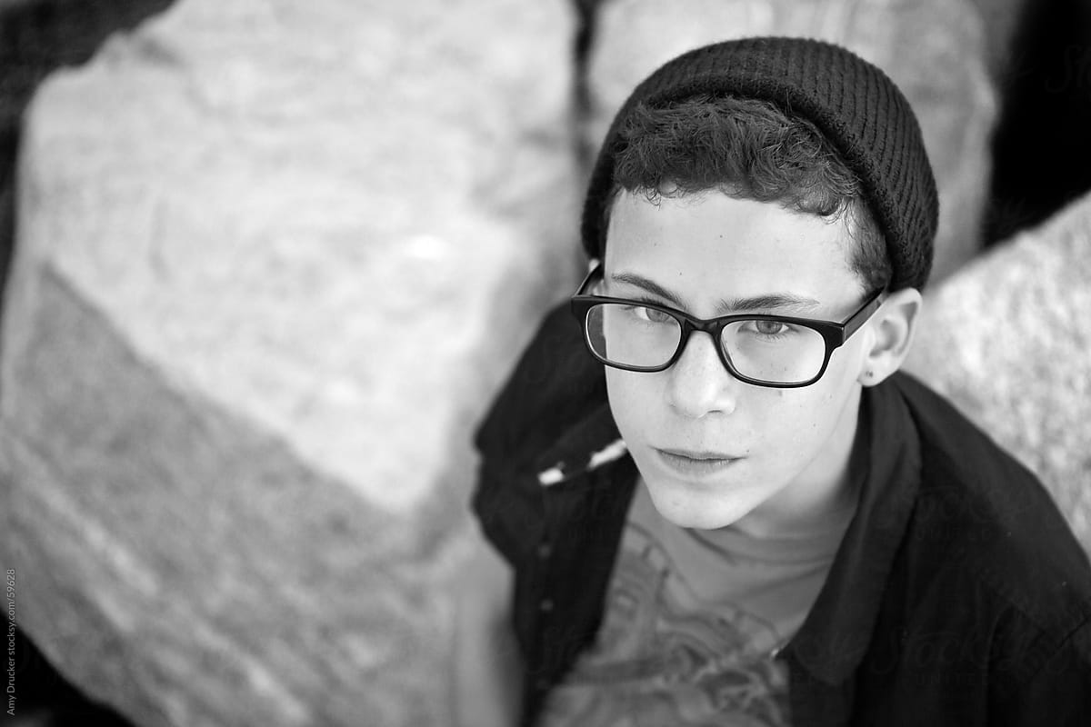 Teenage Boy with Glasses and Hat