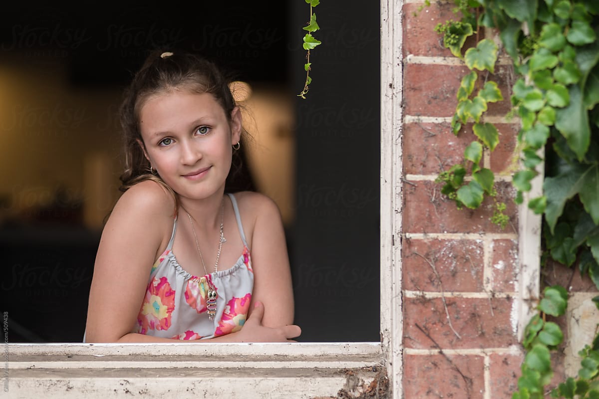 Portrait Of A Teen Girl In A Window By Stocksy Contributor Gillian 