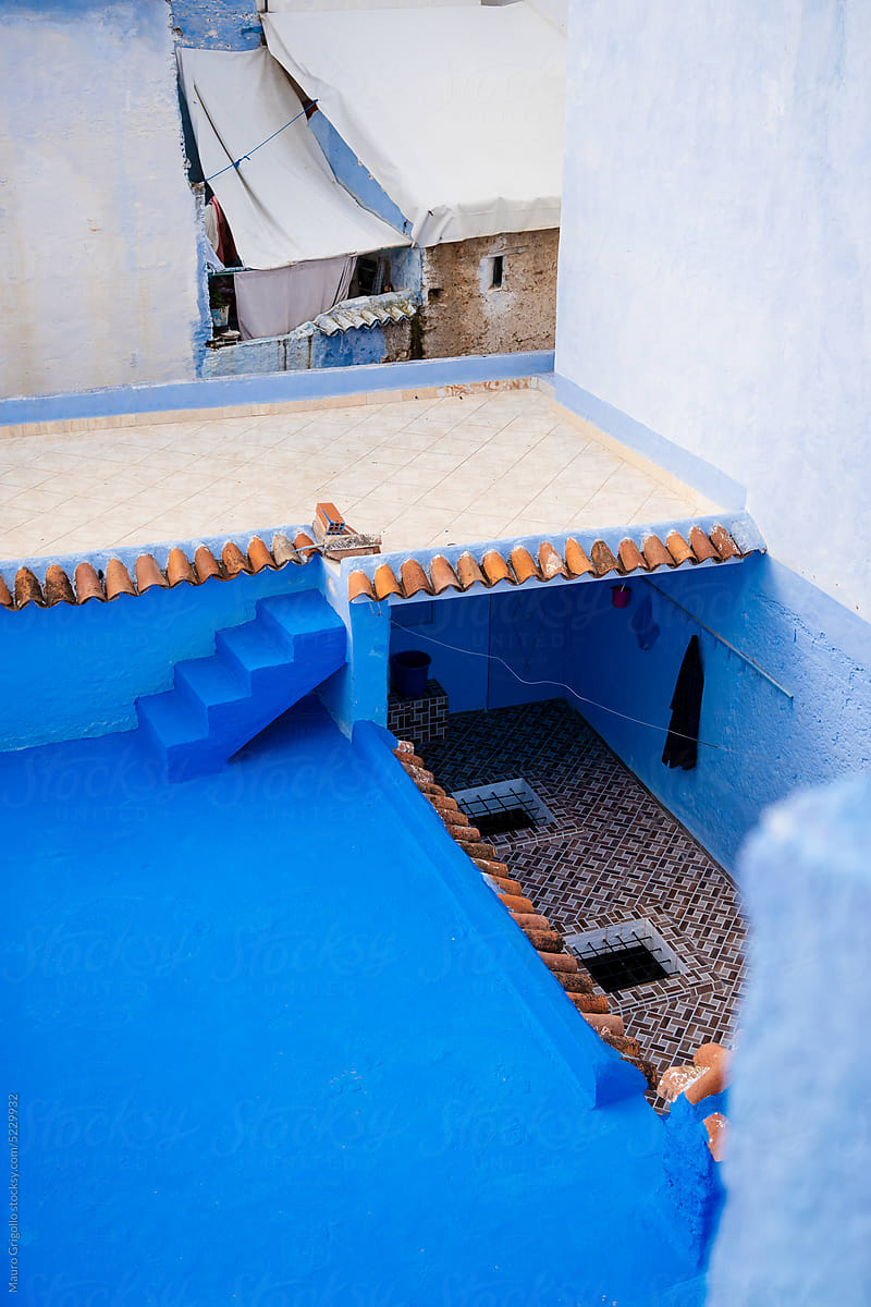 The rooftop of a blue building in Morocco