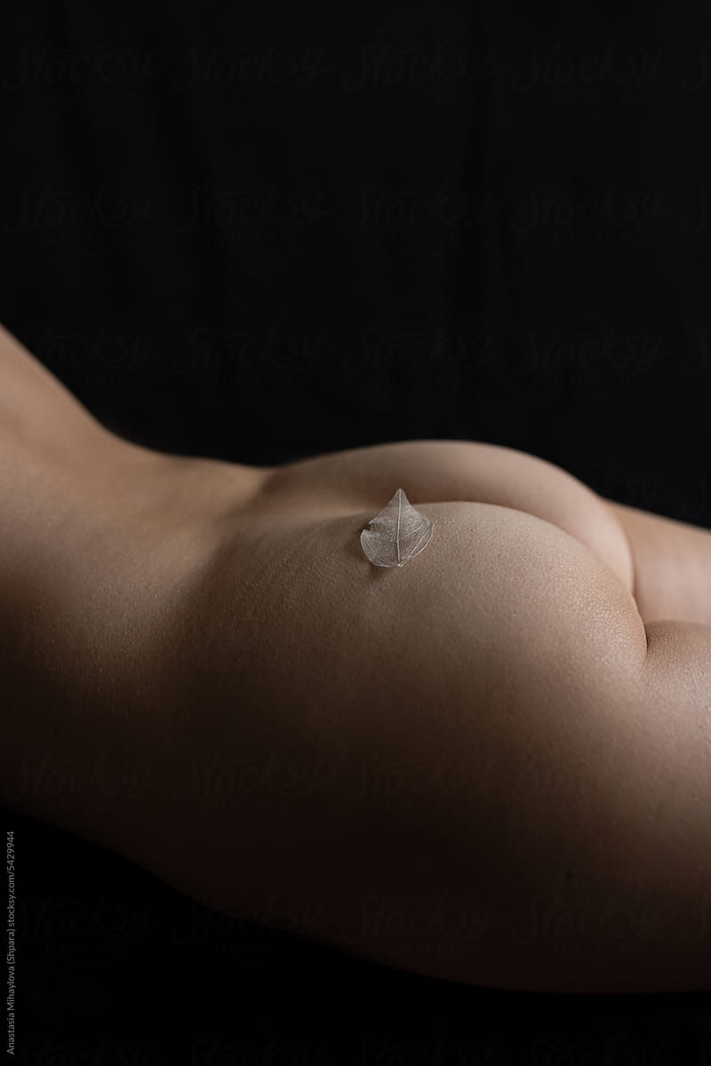 Skin Texture of Female buttocks against black background