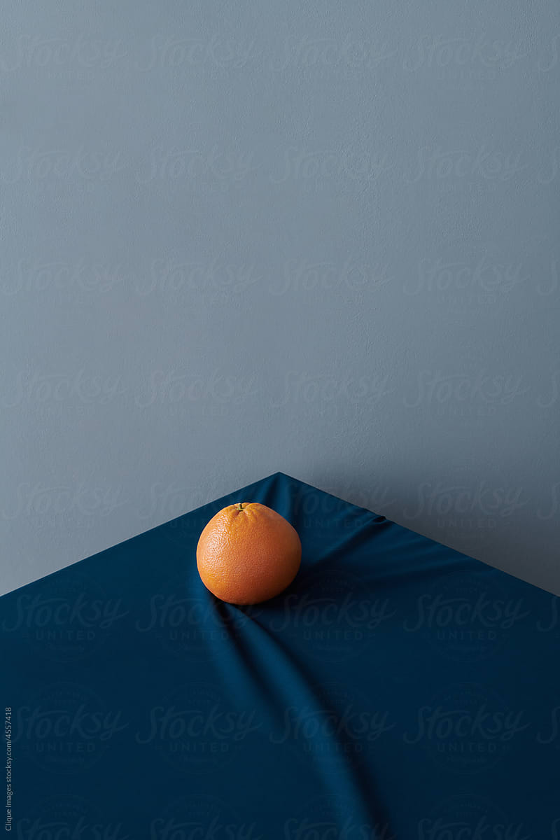 Grapefruit On Dark Blue Surface