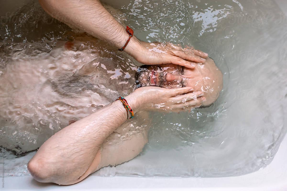 Man Dives into Bathtub for Refreshing Relief