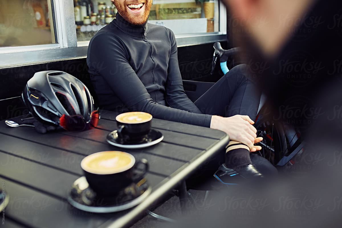 Male Road Cyclist stops for coffee mid ride  Cycling Coffee