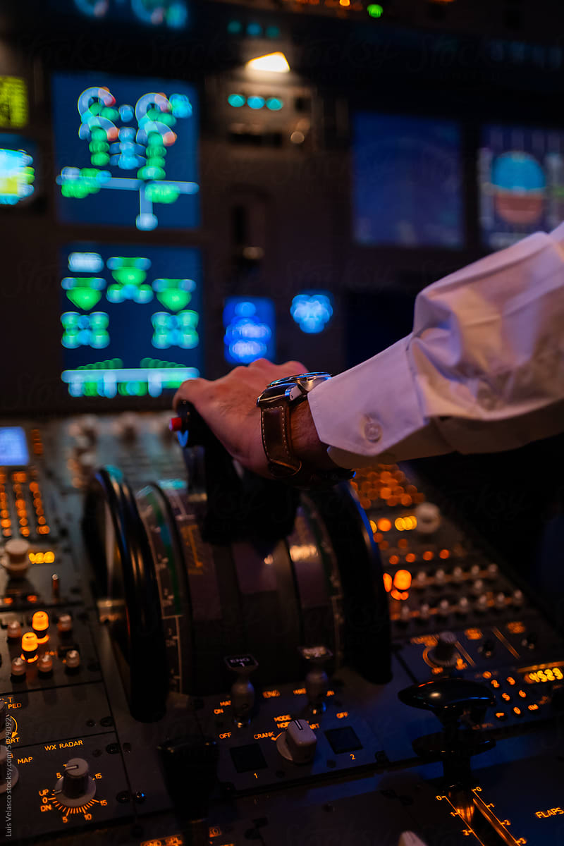 Hand Using An Aircraft Cabin, Flight Academy Simulator.