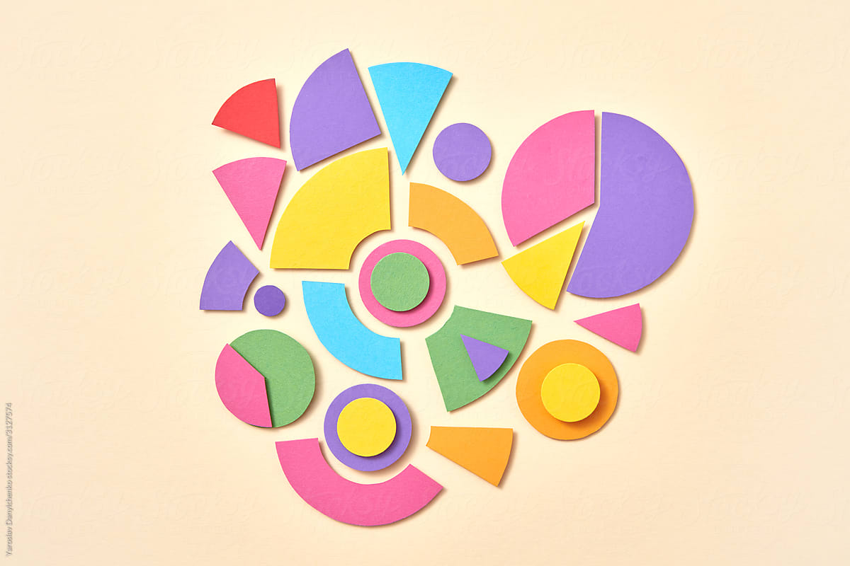 Colorful papercraft geometric figures pattern.