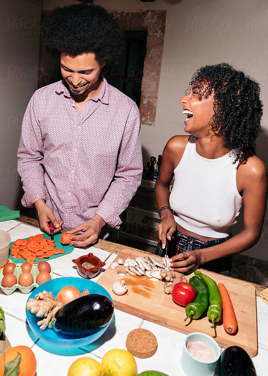 Black Couple Cooking Together In The Kitchen By Stocksy Contributor Lucas Ottone Stocksy 