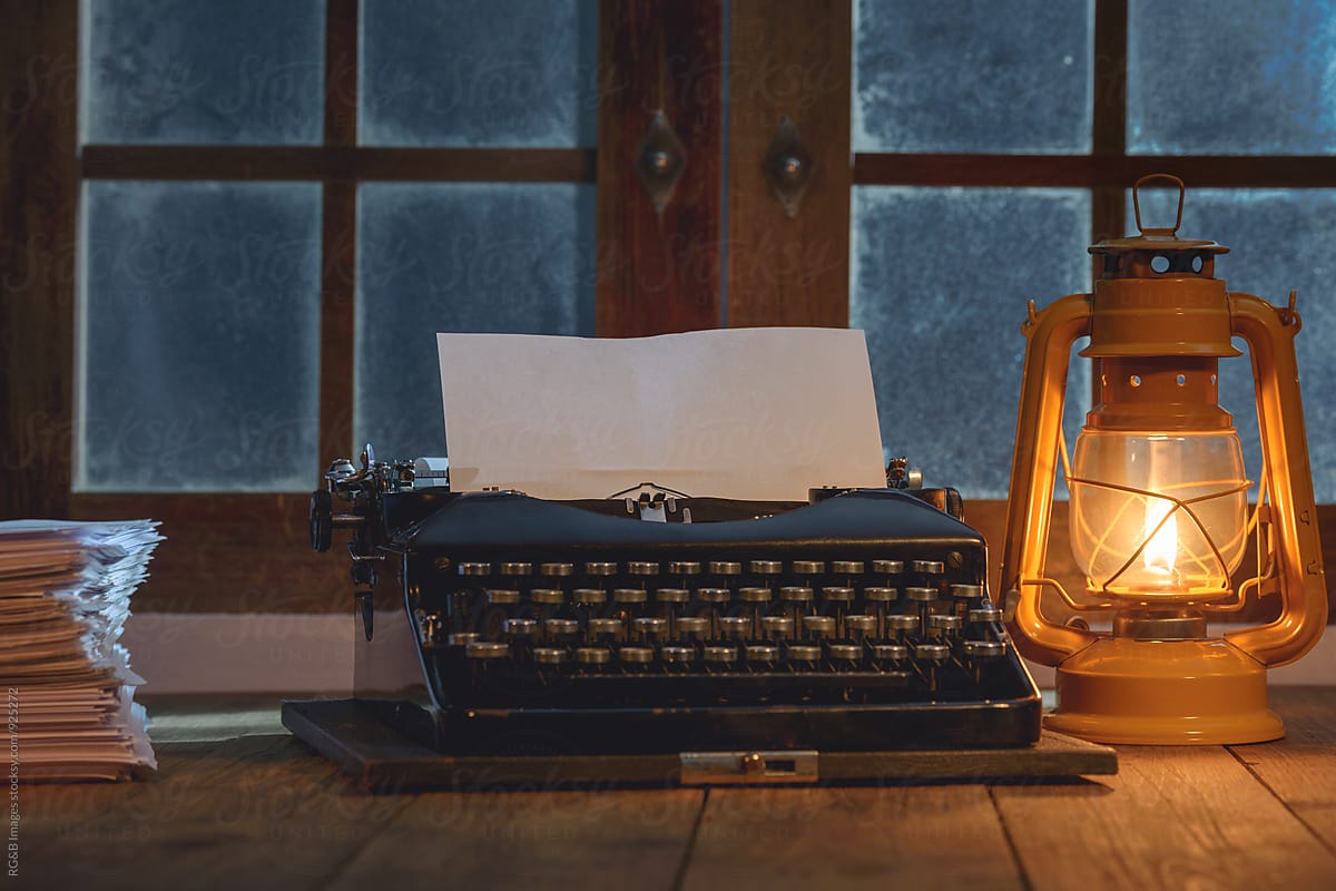 Writer\'s old typewriter on wooden desk