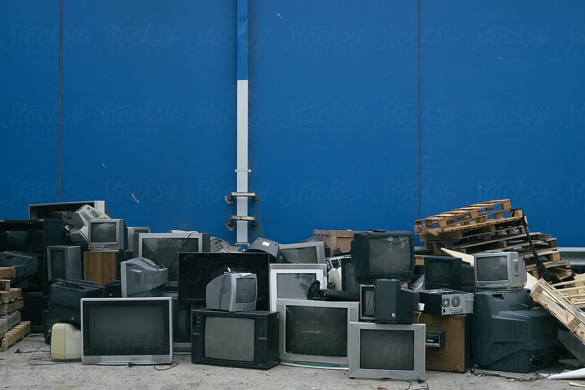 Old Computer and TV monitors thrown out on the street
