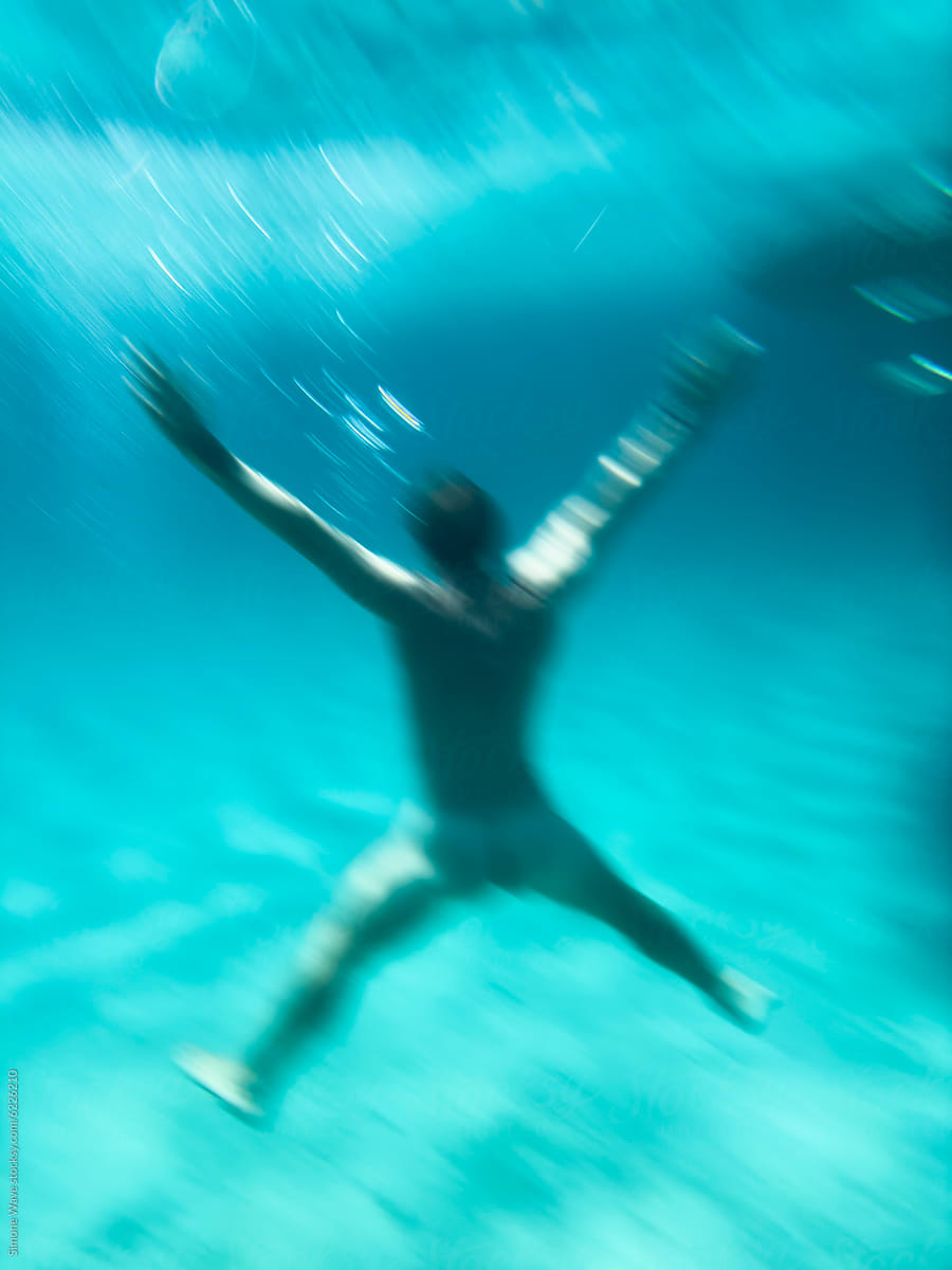 "Naked Man Diving Underwater" by Stocksy Contributor "koganami studio ...