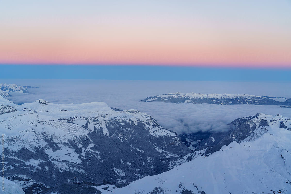 Glowing sky alpine winter landscape