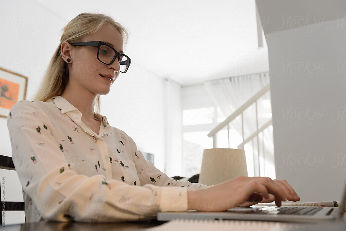 Casual woman working with laptop