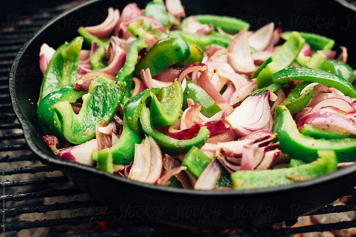 Pepper and onions in a cast iron skillet