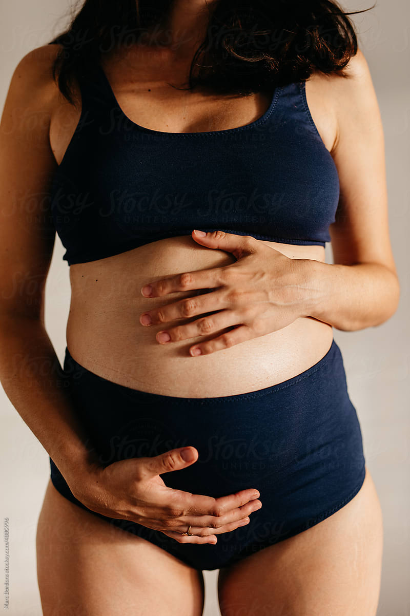 close-up of the belly of a pregnant woman