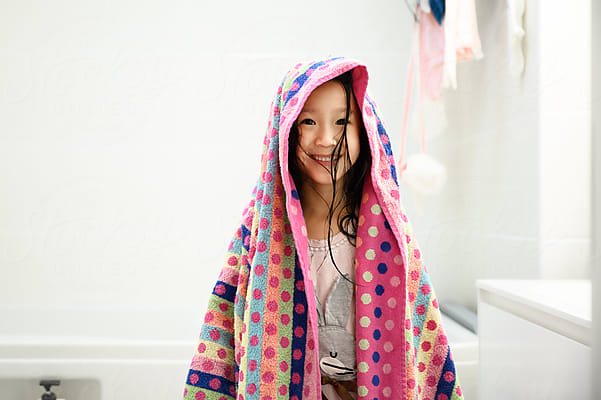Portrait Of Girl Wearing Socks by Stocksy Contributor MaaHoo