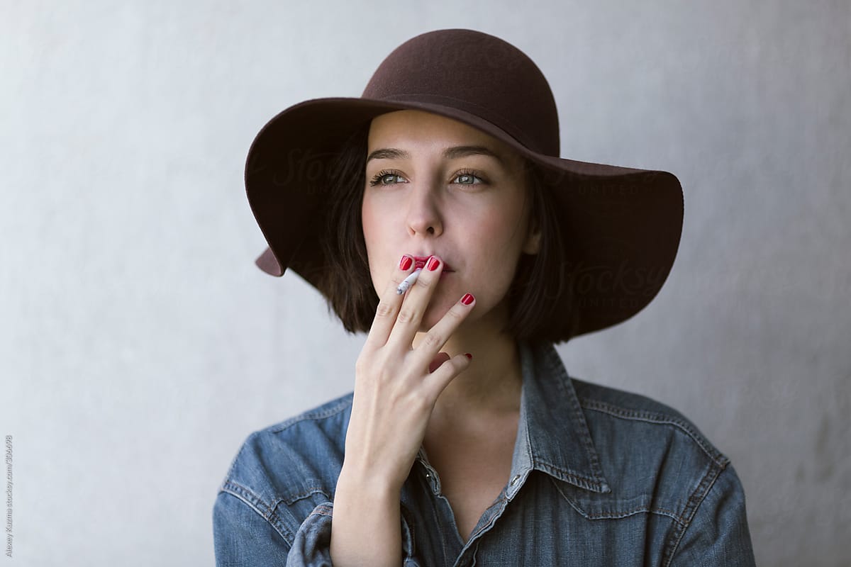Beautiful Girl Smokes By Stocksy Contributor Alexey Kuzma Stocksy