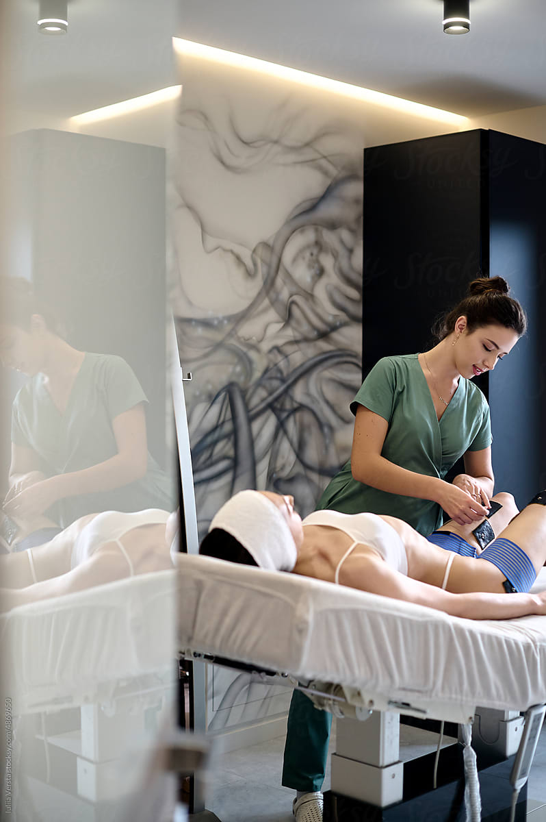 Body treatment in modern beauty room