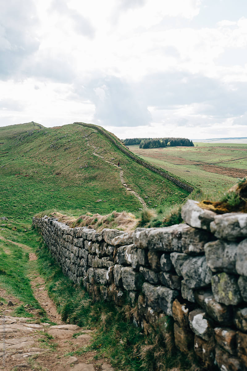 Hadrian\'s wall with more wall winding into the distance