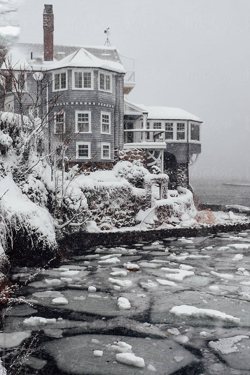 Coastal House in New England during winter blizzard storm