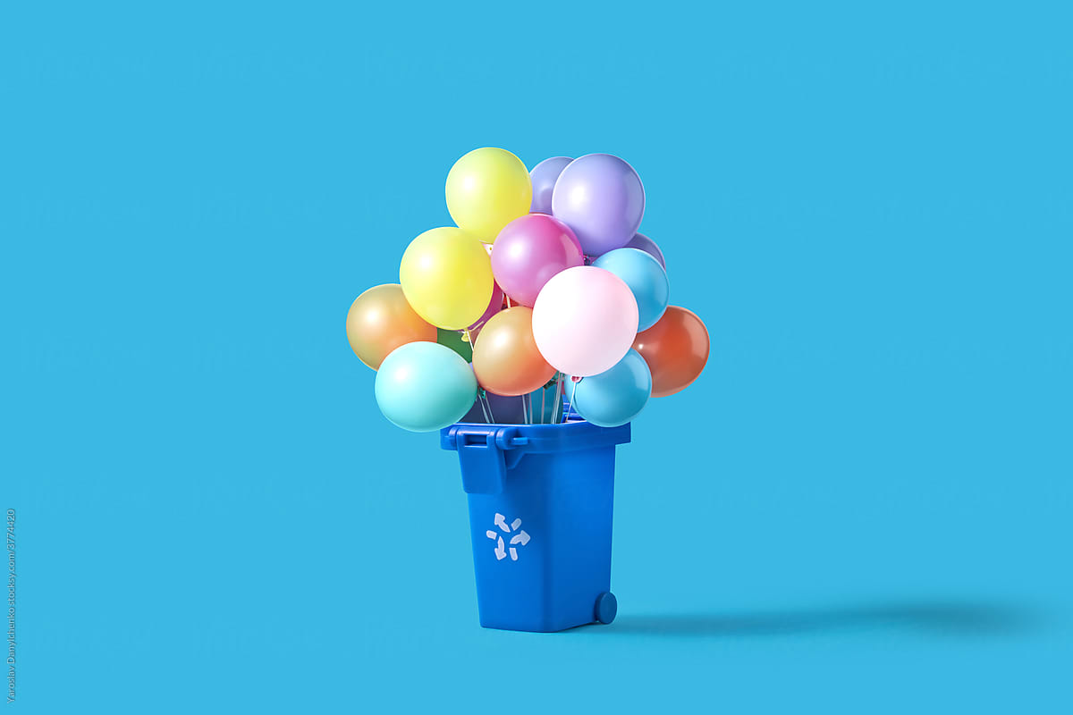 Balloons in blue trash bin