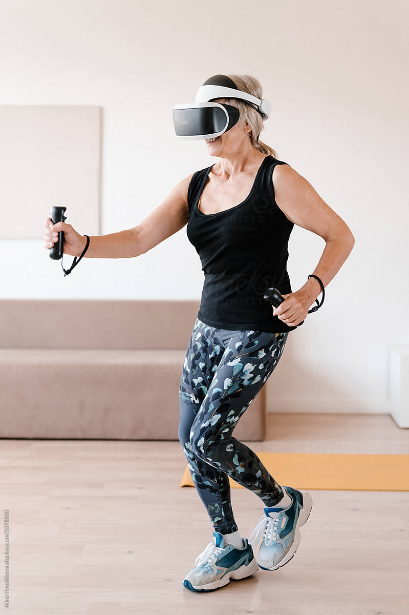 Elderly female athlete during VR workout