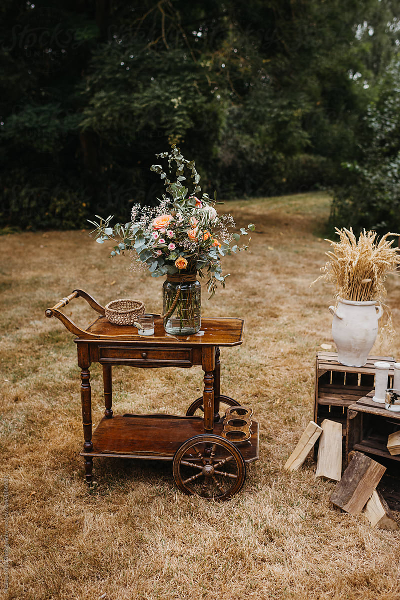 rustic wooden trolley table on a wedding outdoors