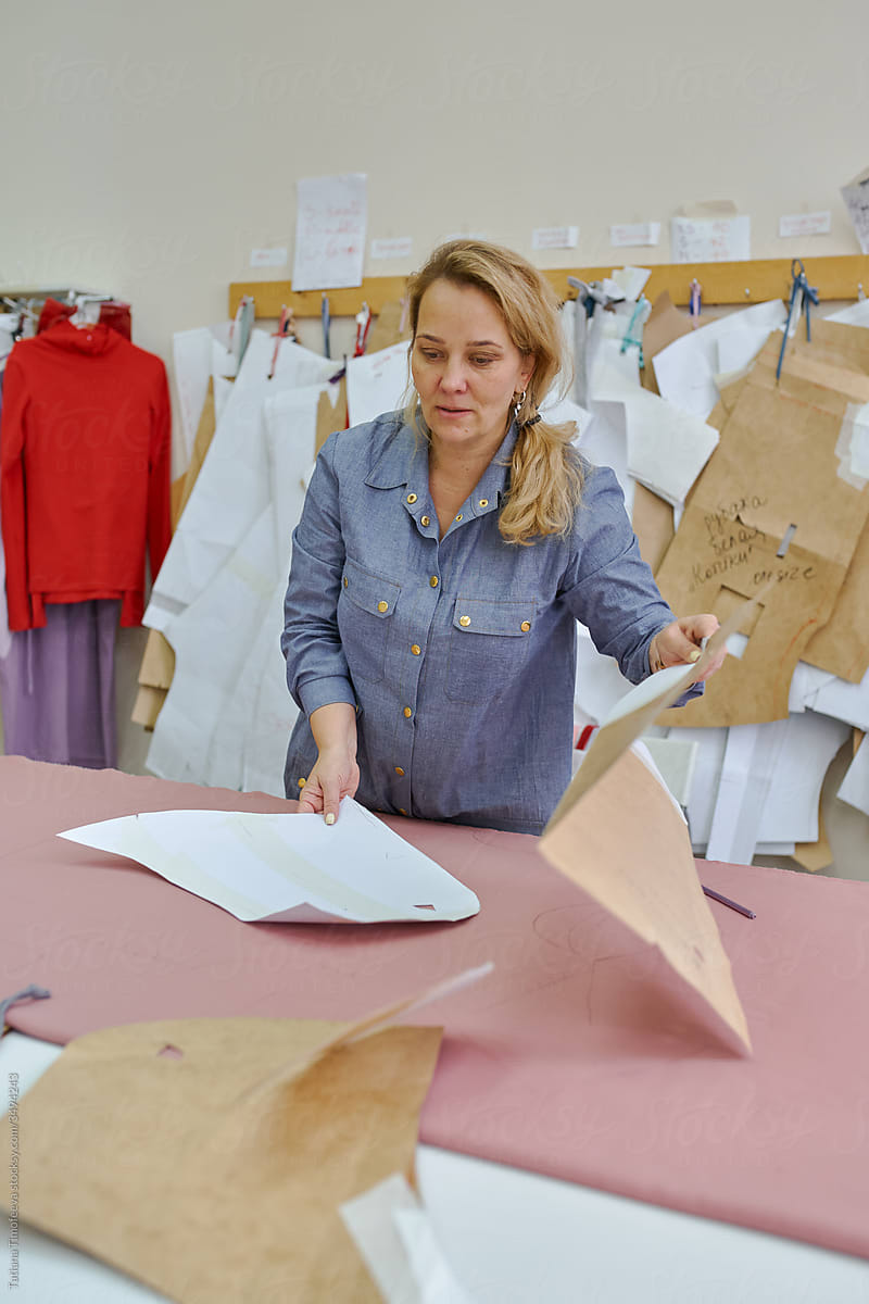 business woman fashion designer at her in her clothing manufacturing office