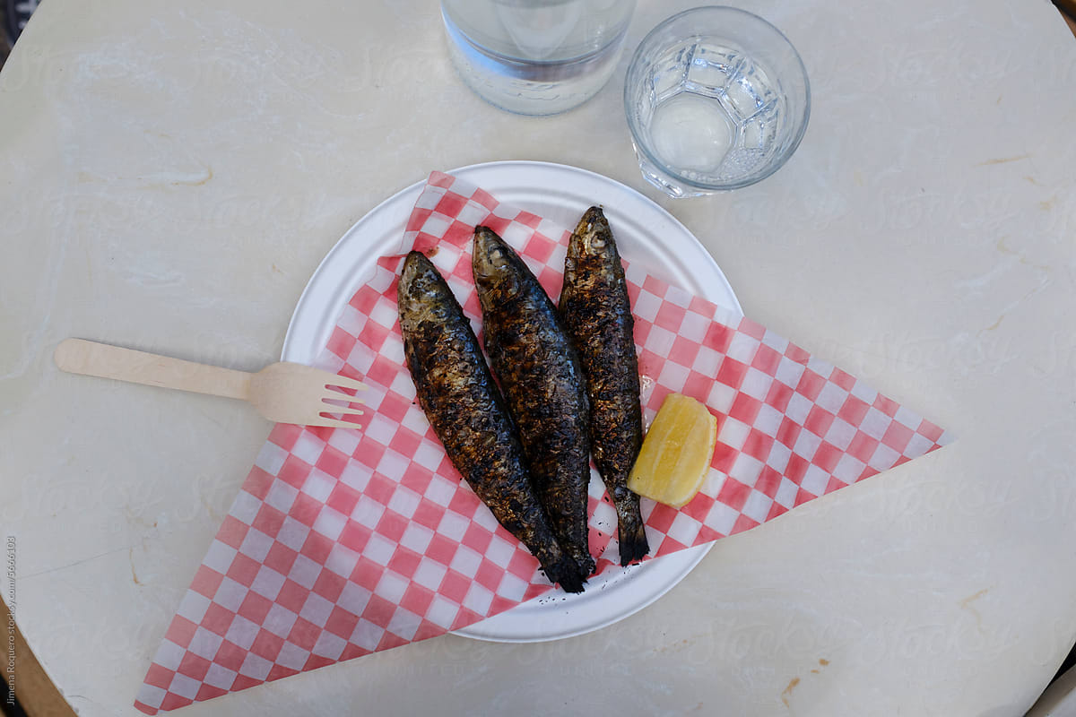 Street food dish of grilled sardines