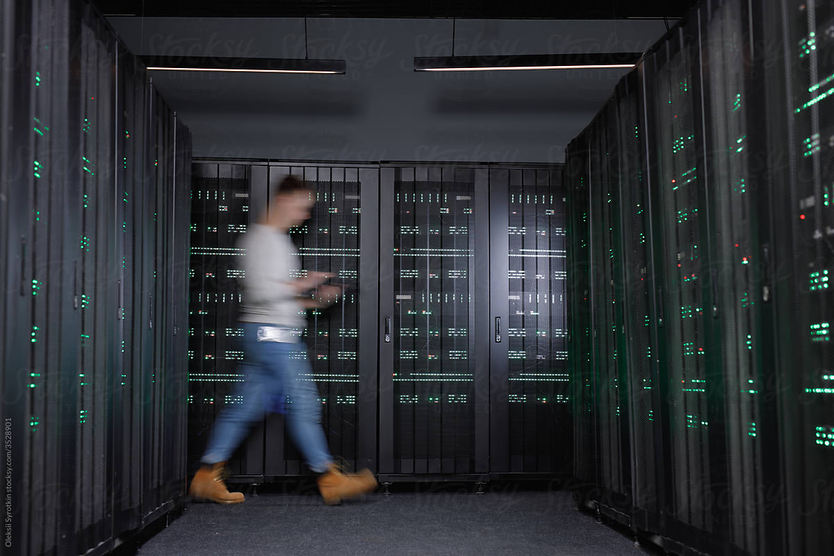 Busy worker spending time in data centre