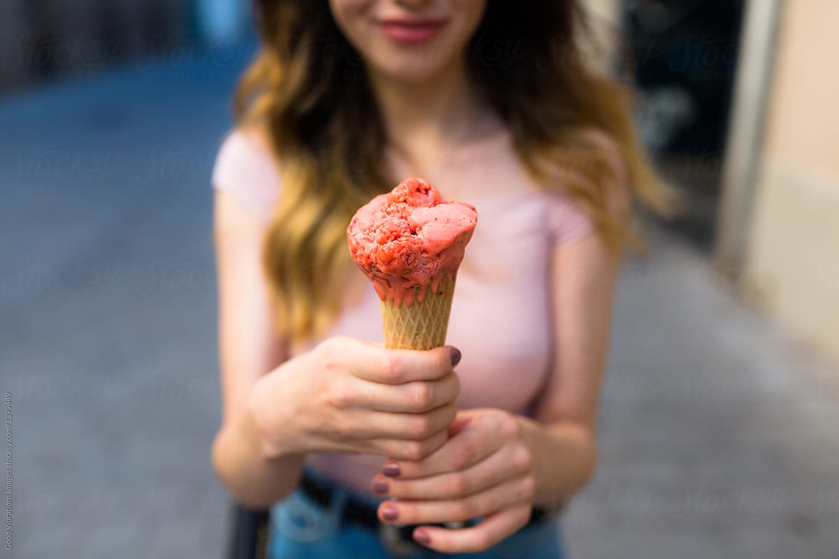 Woman holding an icecream