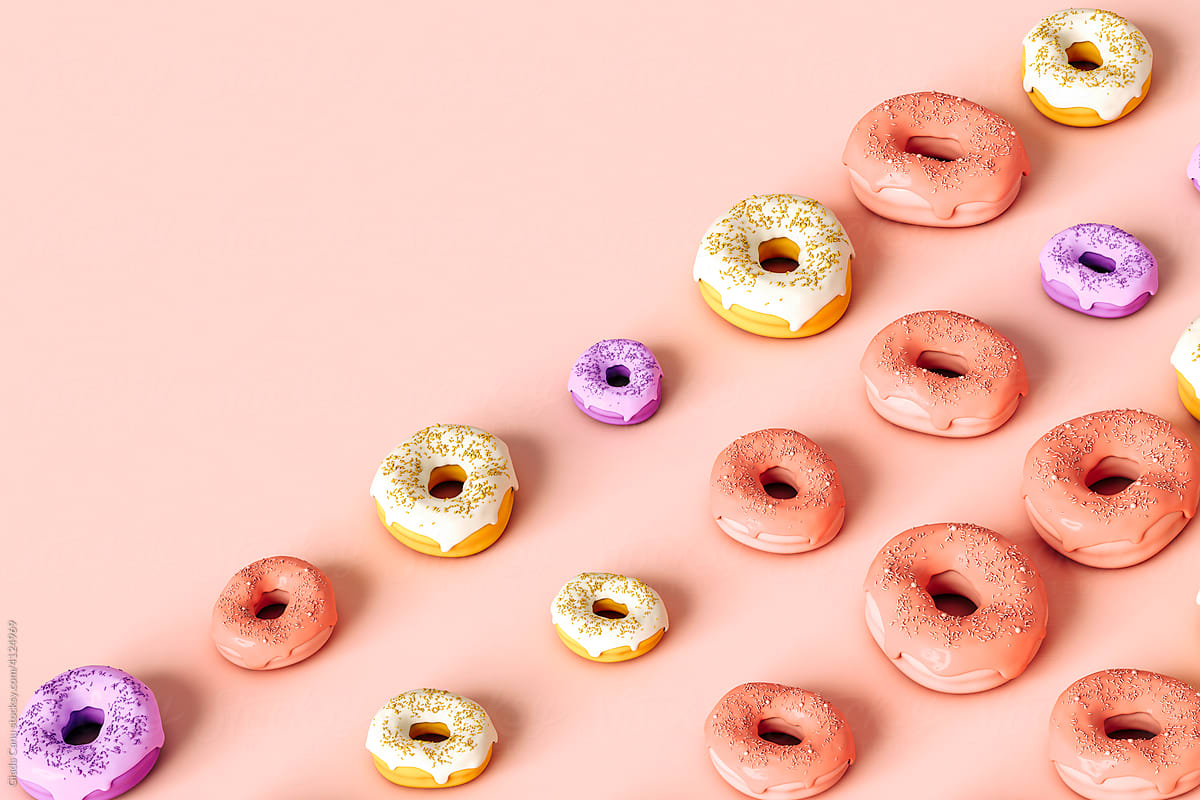 Colorful donuts in different sizes and positions