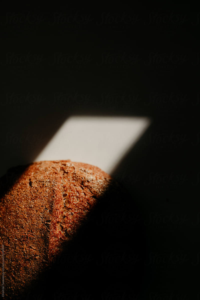 Bread On Light Against Dark Shadow.