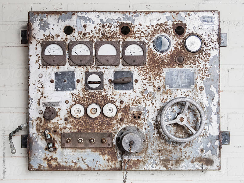 Old rusty regulator on a wall