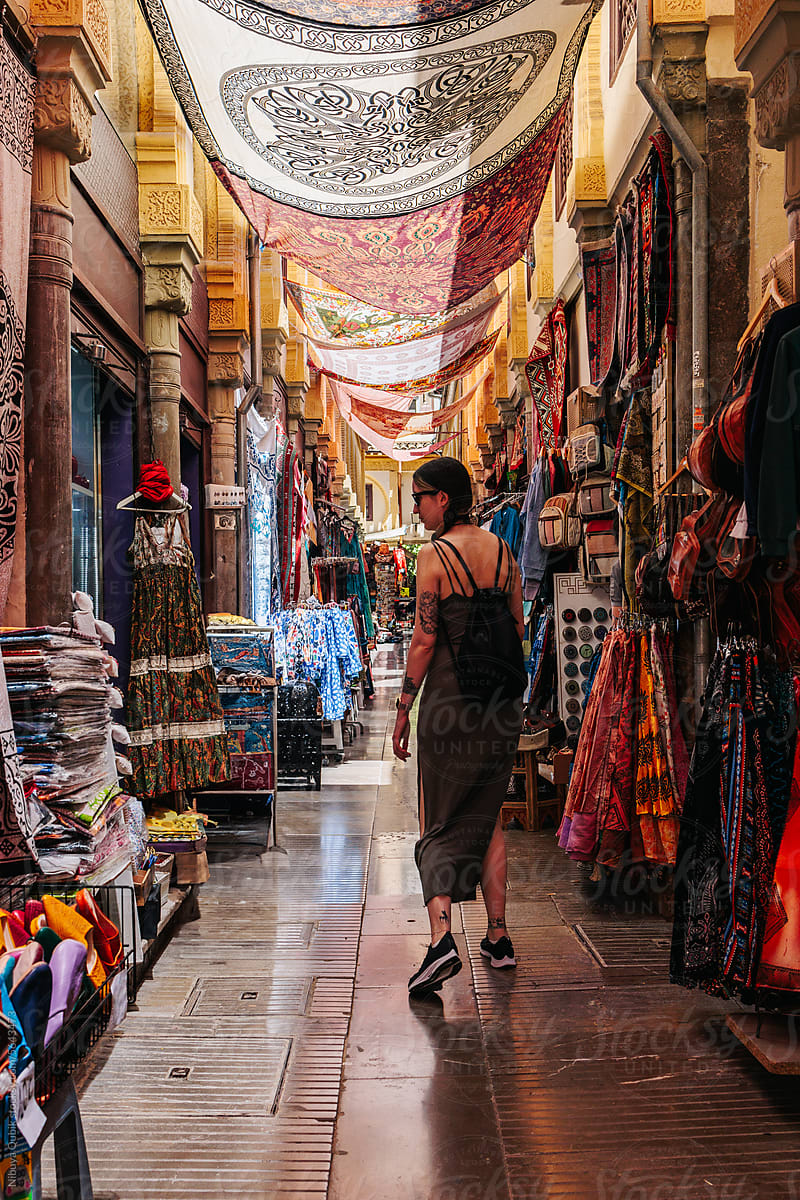 Young tourist strolling through a traditional market