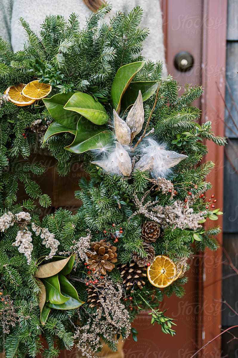 close up of handmade christmas wreath with natural materials