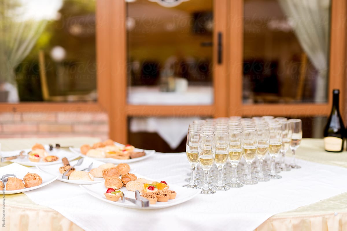 Wedding reception with finger food and champagne