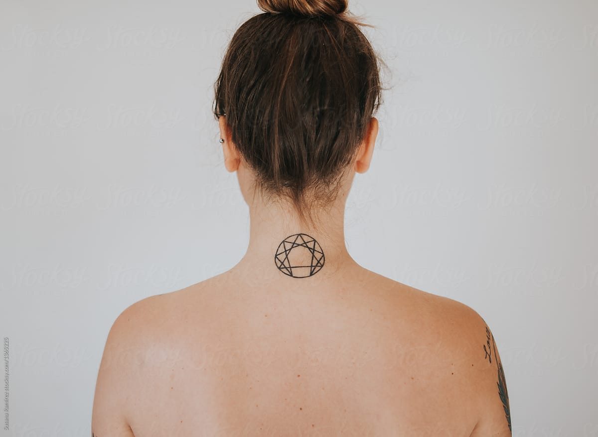 Back Of Woman With Tattoo On The Neck by Stocksy Contributor Susana  Ramírez - Stocksy